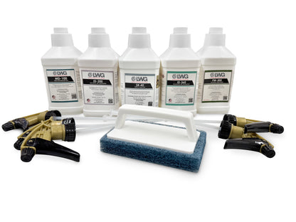 Set of cleaning products including bottles, a scrubber, and nozzles on a white background