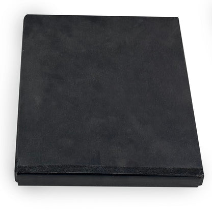 Black rectangular cushion on a white background
