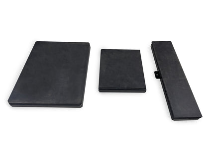Three black rectangular objects on a white background