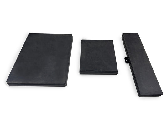 Three black rectangular objects on a white background