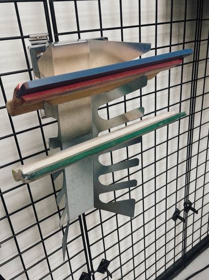 Wall-mounted aluminum squeegee rack holding six screen printing squeegees.