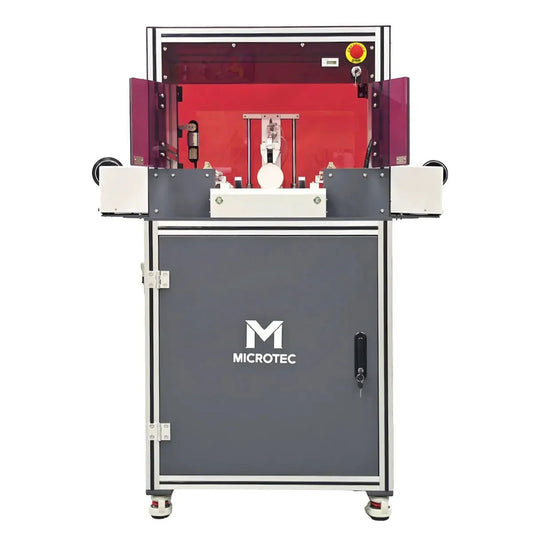 Industrial machine with 'Microtec' branding on a white background