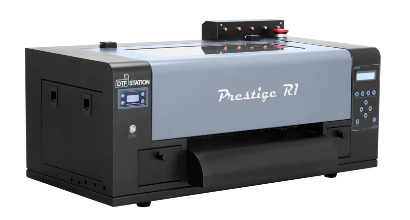 Digital printing machine with 'Prestige R1' branding on a white background