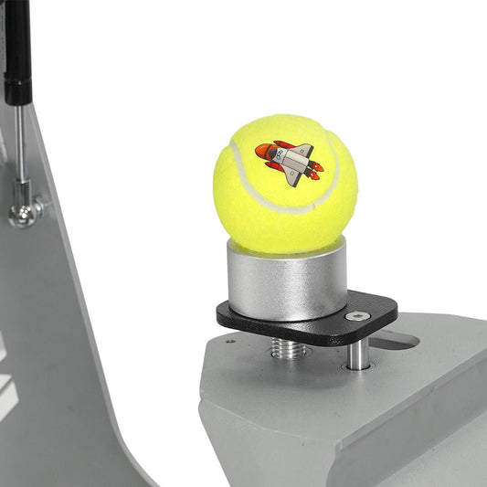 Yellow tennis ball with a rocket design on a metal stand against a white background