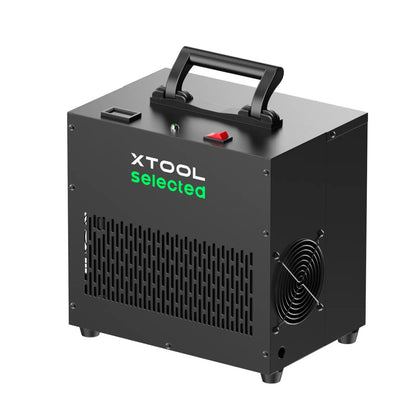 xTool Selected HyperPure Air Dryer in a matte black industrial finish, featuring a top carrying handle, power switch, and side ventilation cooling fan.